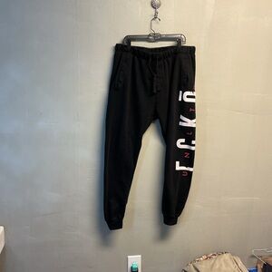 Black Joggers with White and Red Lettering 3XL.  0140